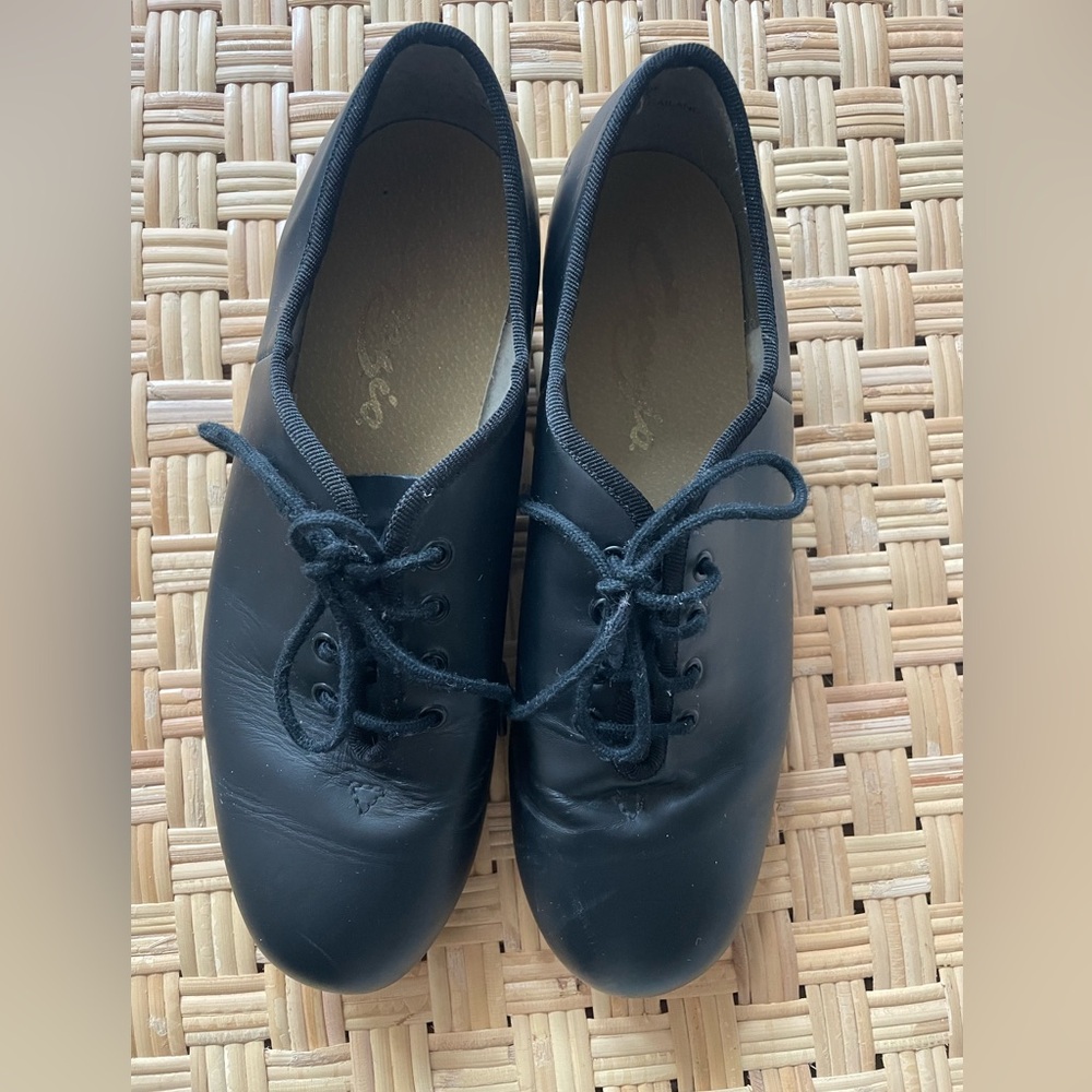 Capezio black tap shoes, size 8.